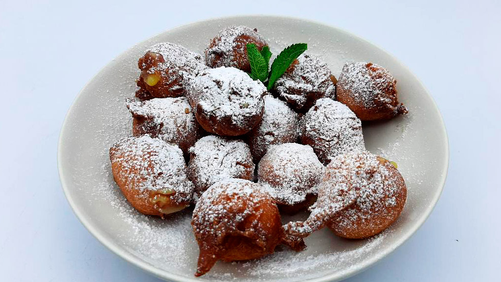 Suspiros de monja rellenos de naranja, repostería conventual en Cómetelo